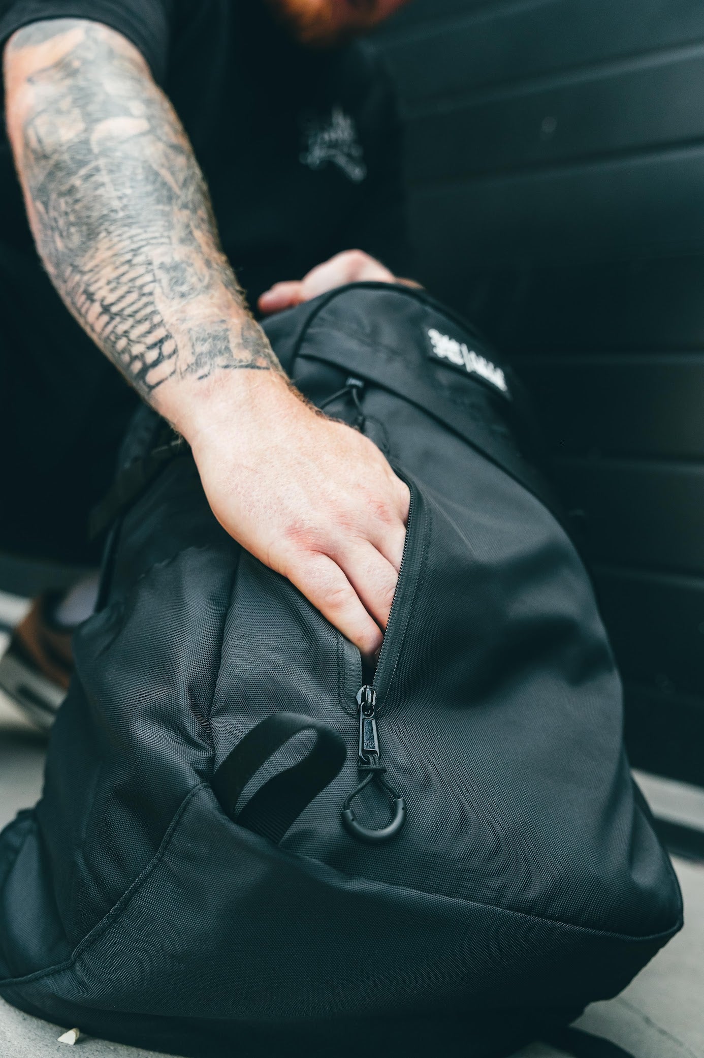 Black detailing rucksack – top zip and compartments view