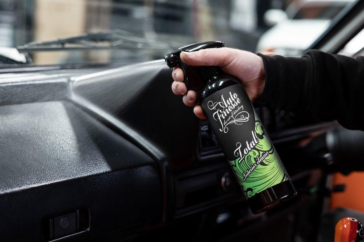 Total Interior Car Cleaner Being Sprayed