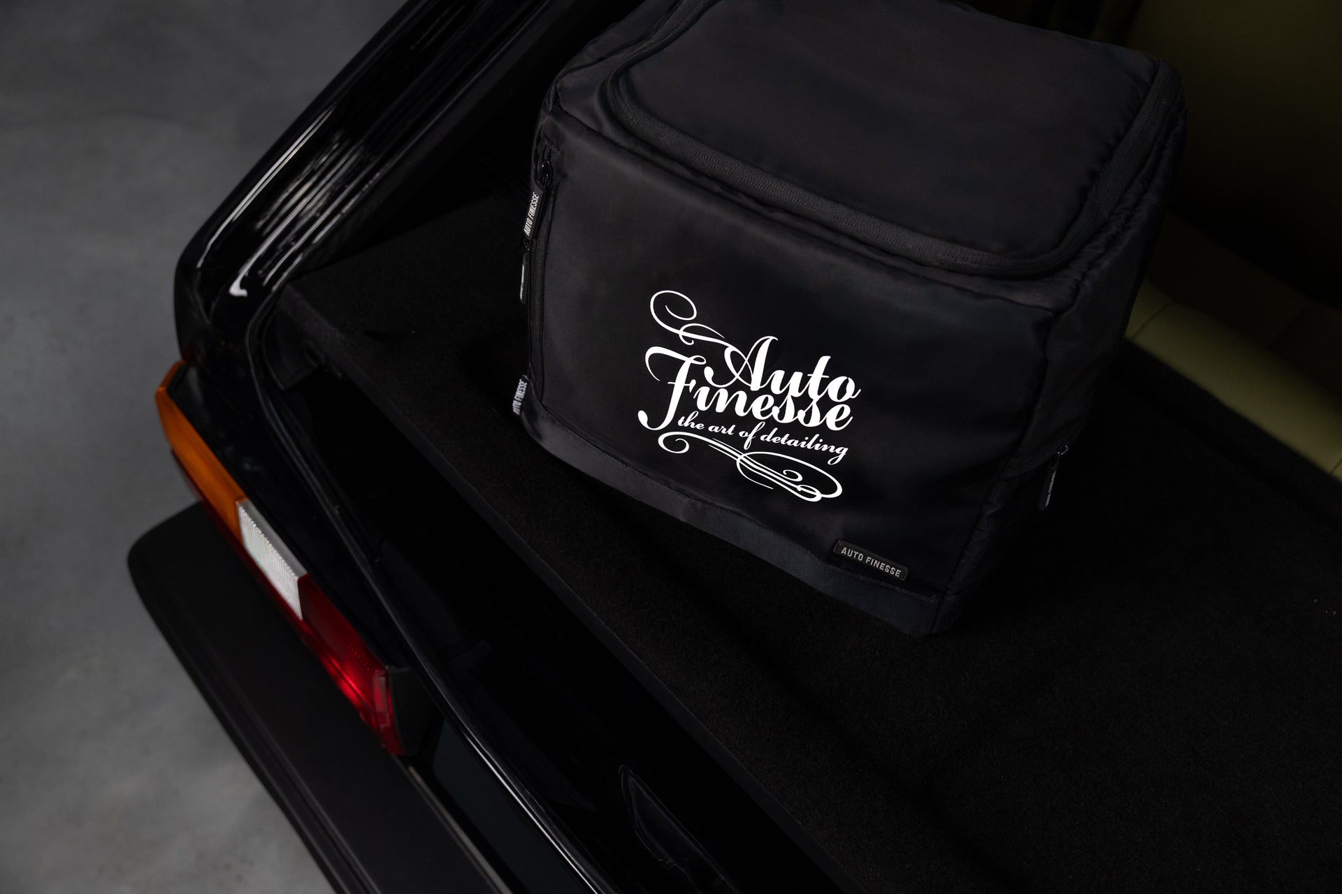 Auto Finesse detailing bag in car trunk
