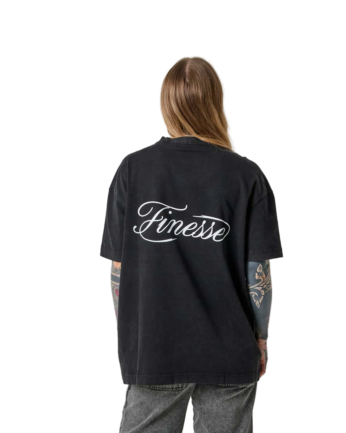 Person wearing a black t-shirt with 'Finesse' printed on the back against a white background