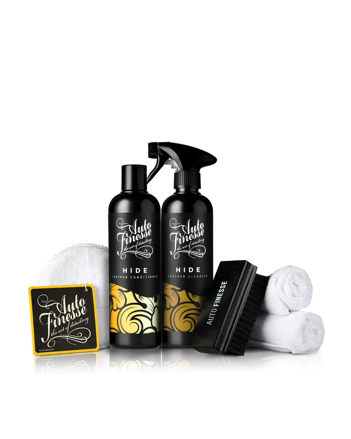 Automotive care product set with bottles, brush, and cloths on a white background Leather Cleaning Kit