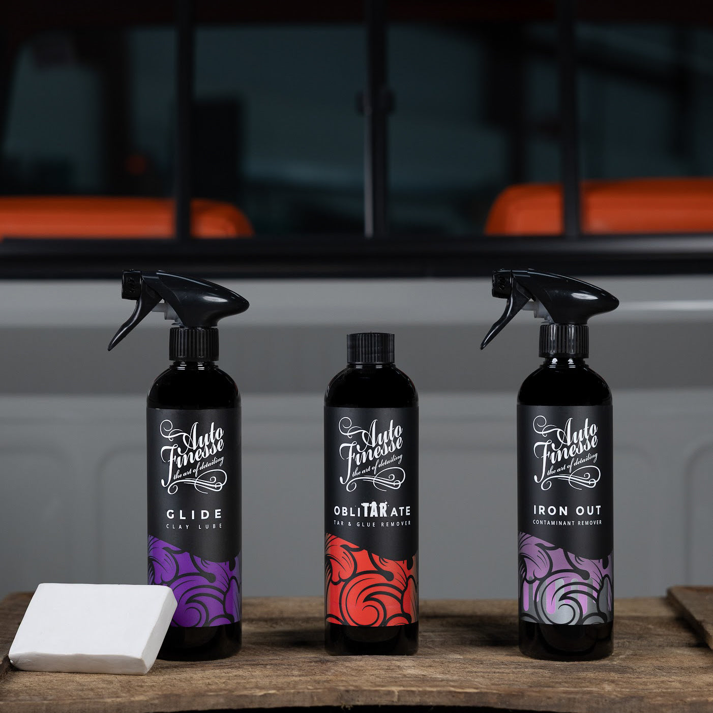 Decontamination products on a wooden table_ Connoisseurs Kit