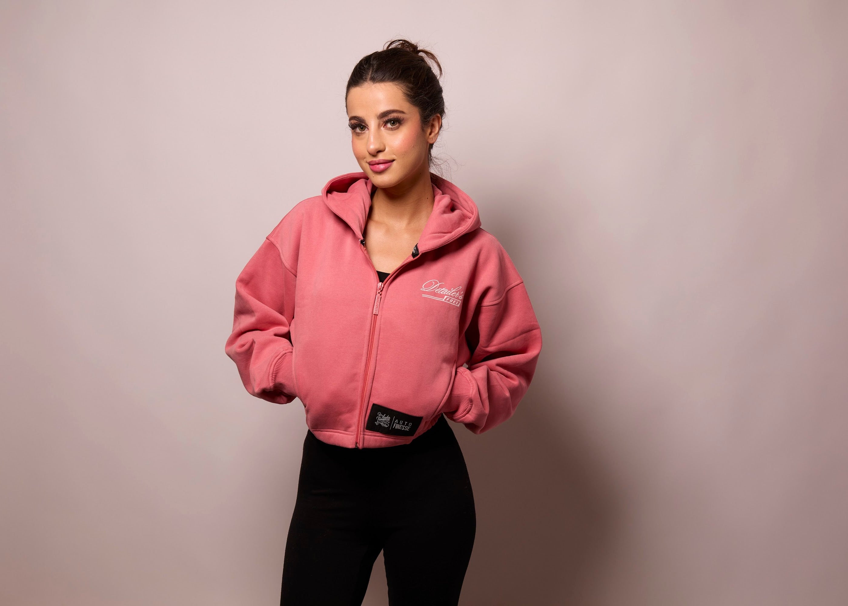 Woman wearing Auto Finesse cropped zip-up hoodie