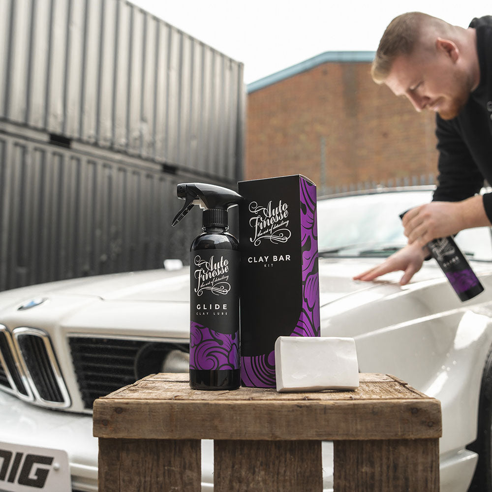 Using Auto Finesse Clay Bar Kit on car surface