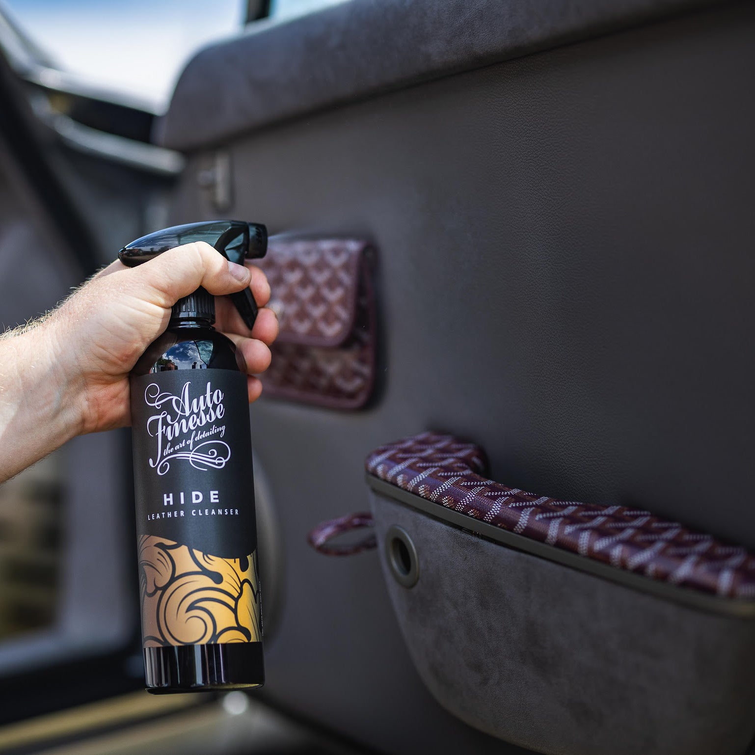 Using Hide Leather Cleaner on Car Door