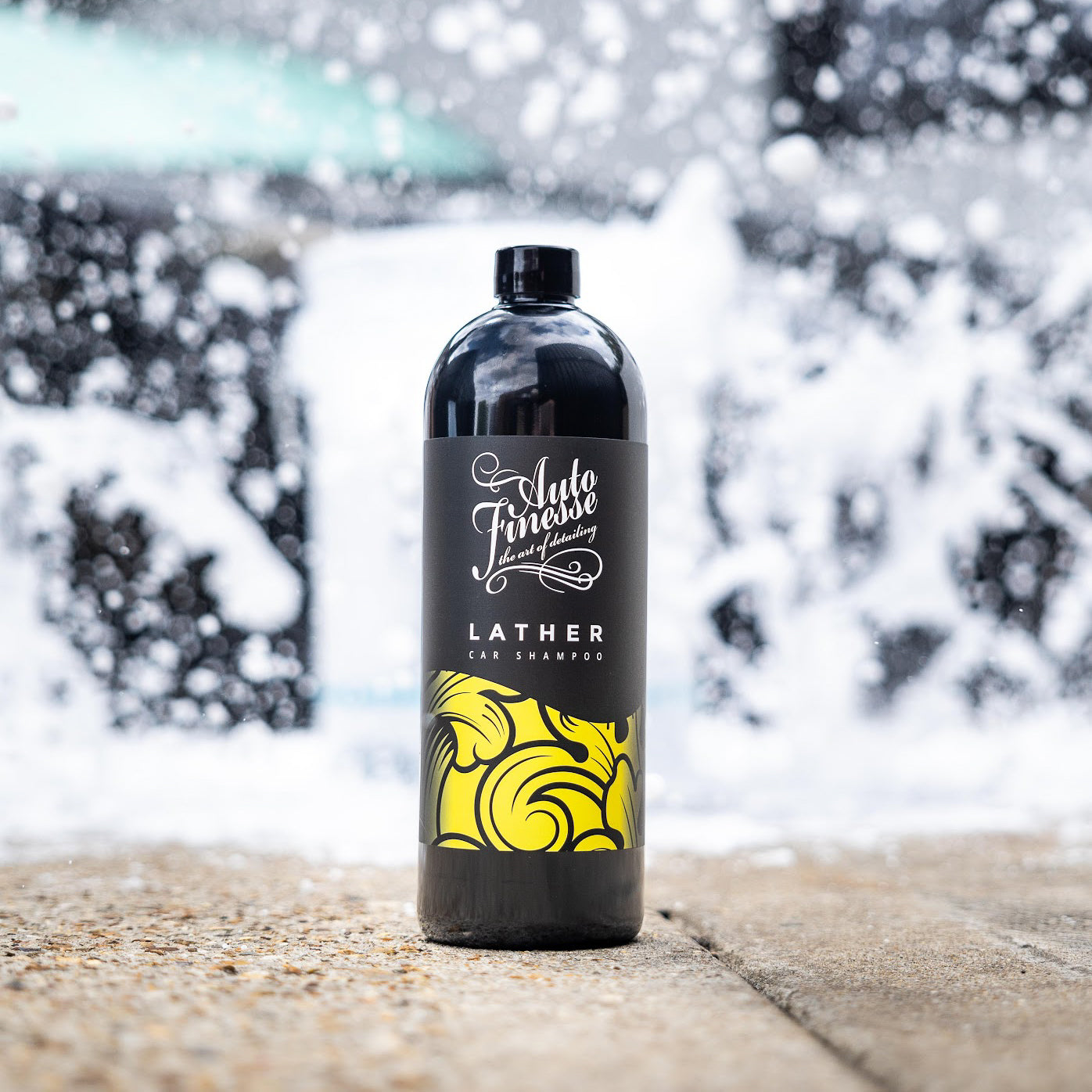 Auto Finesse Lather car shampoo with foamy background_ The Signature Selection