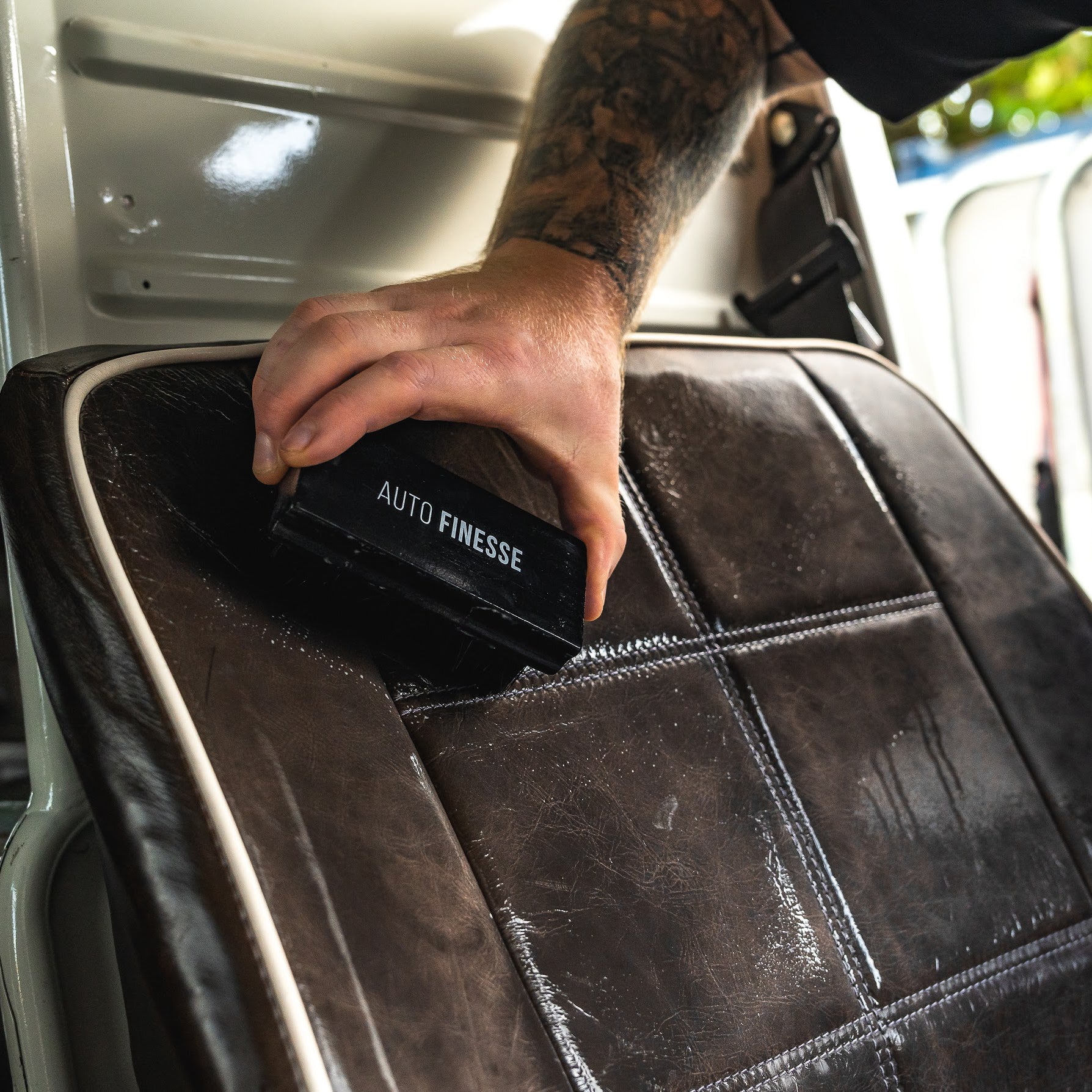 Leather Cleaning Kit - Using Upholstery Brush on Car Leather