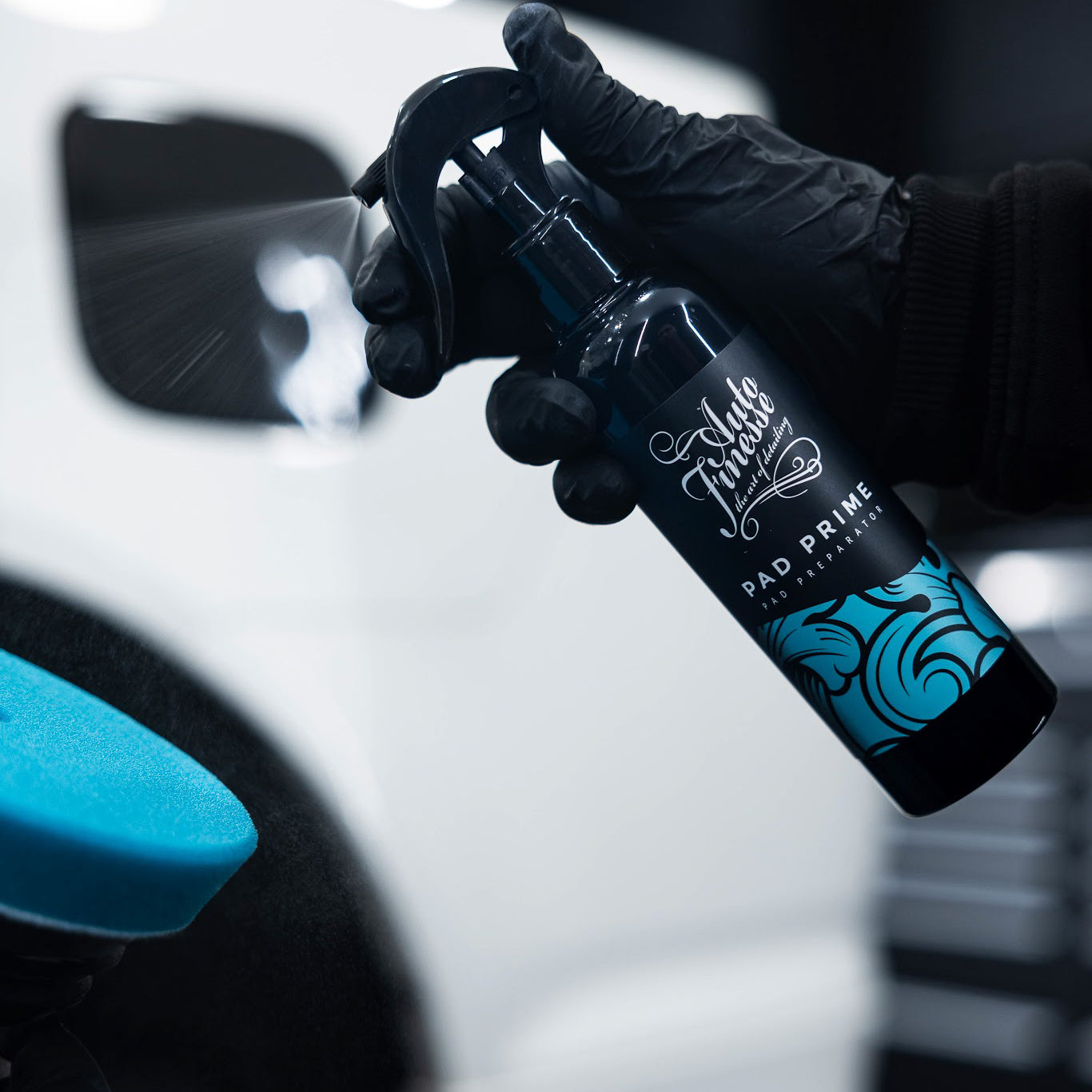 Pad Prime Being Applied To Blue Pad Square