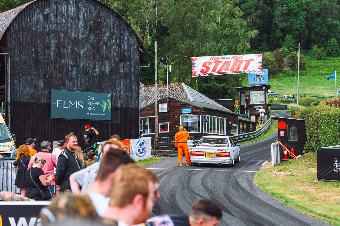 Crowd watching cars at Run for the Hills car event