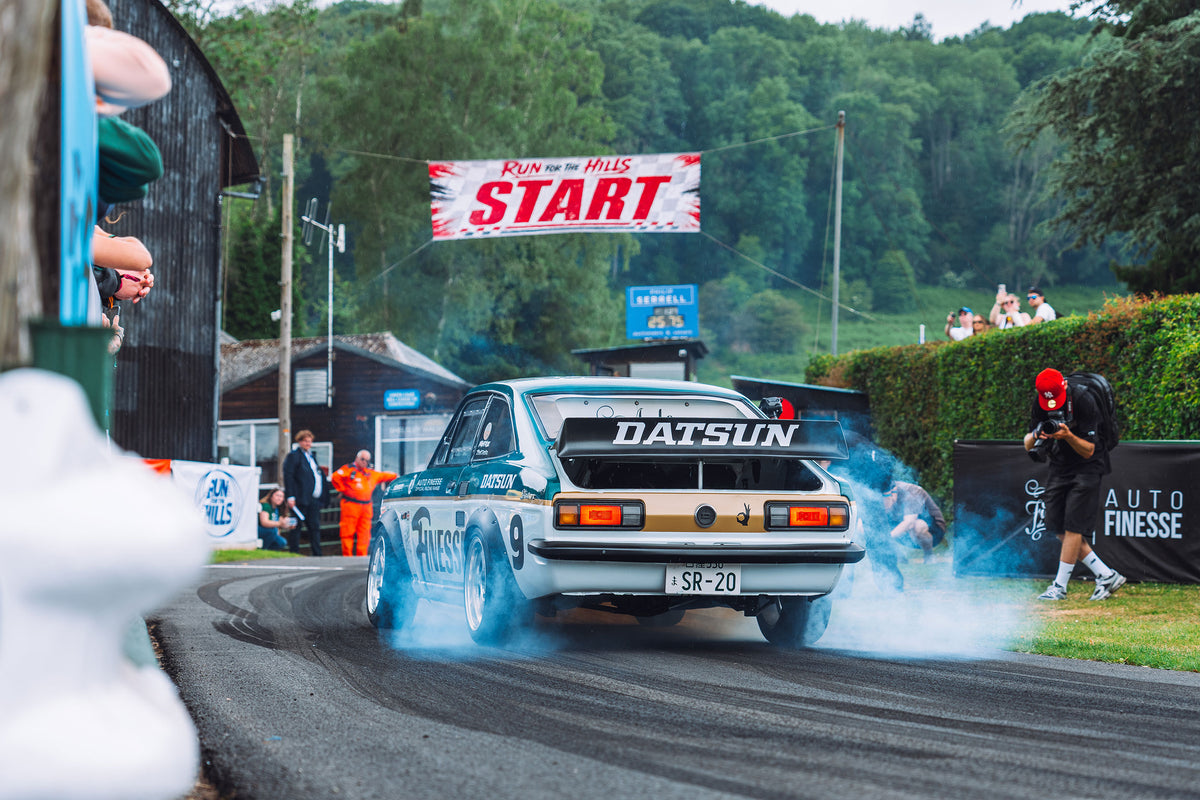 White Datsun at the start line of Run for the Hills