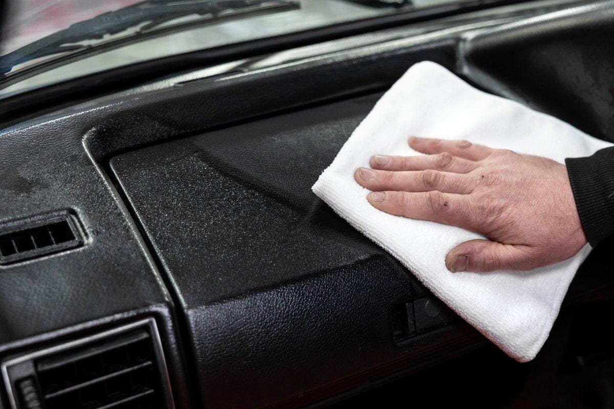 Applying Total Interior Cleaner with Microfibre Cloth