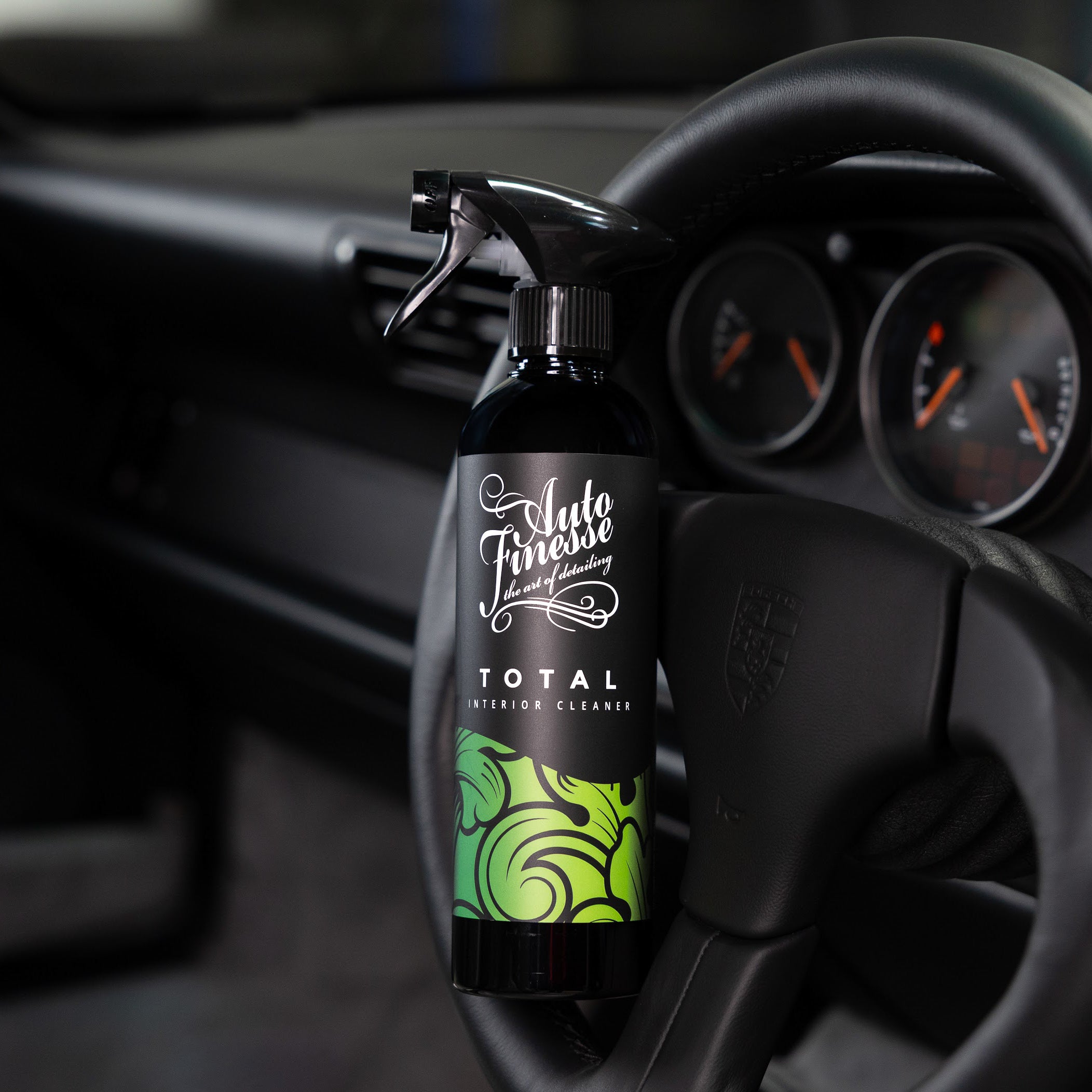 Auto Finesse Total Interior Cleaner on Porsche steering wheel