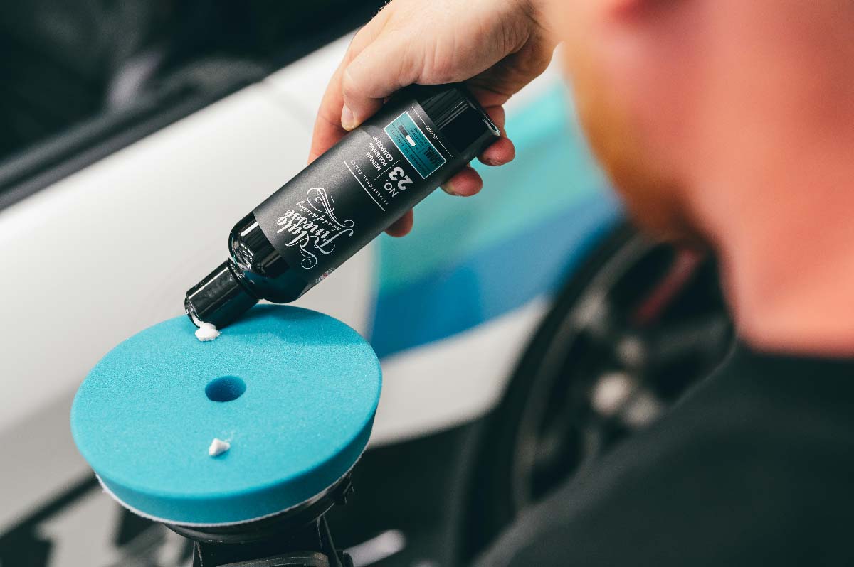 Medium Polishing compound dropped onto blue polishing pad