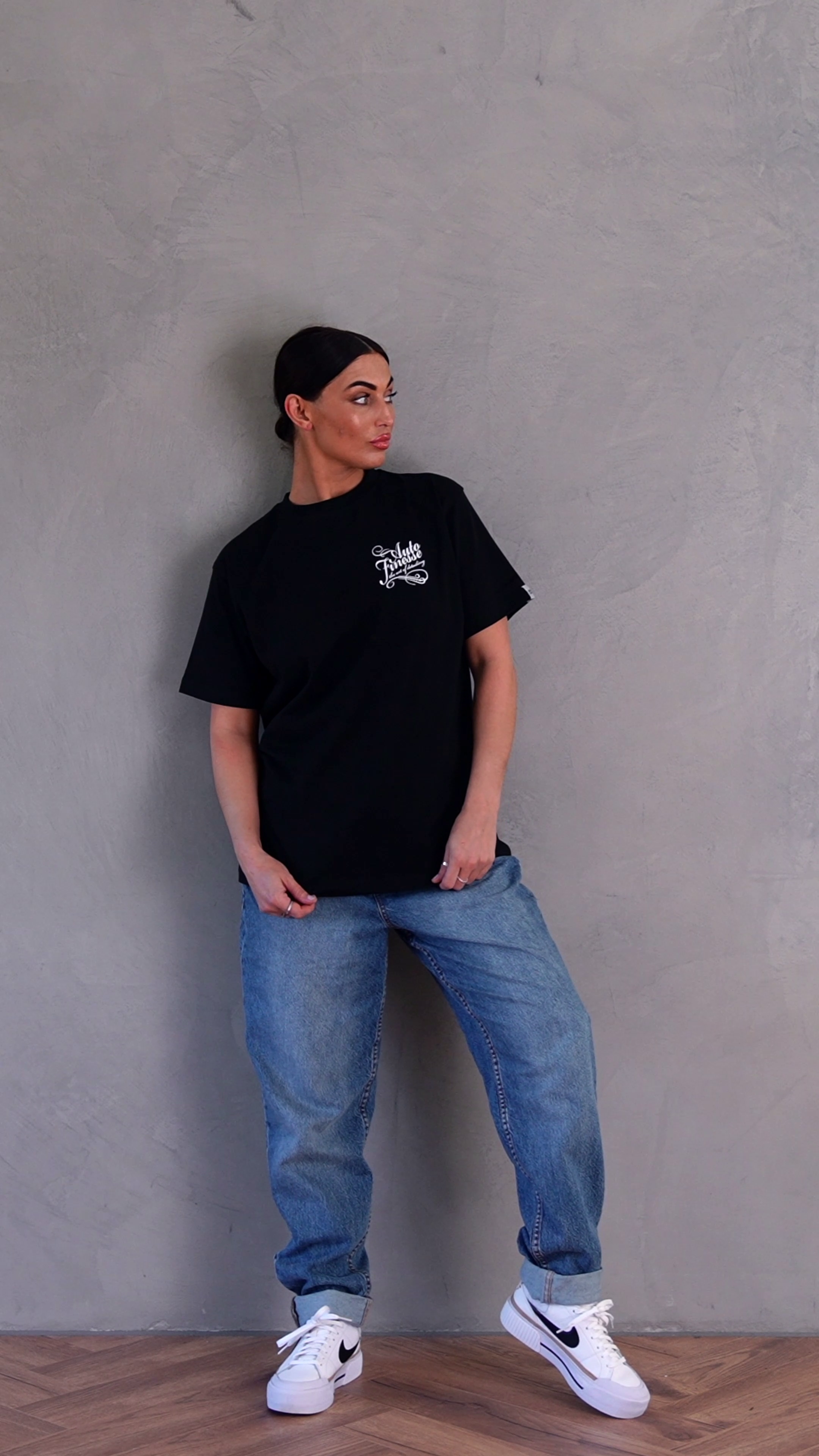 Detailers Signature T-Shirt Black_ Woman Wearing